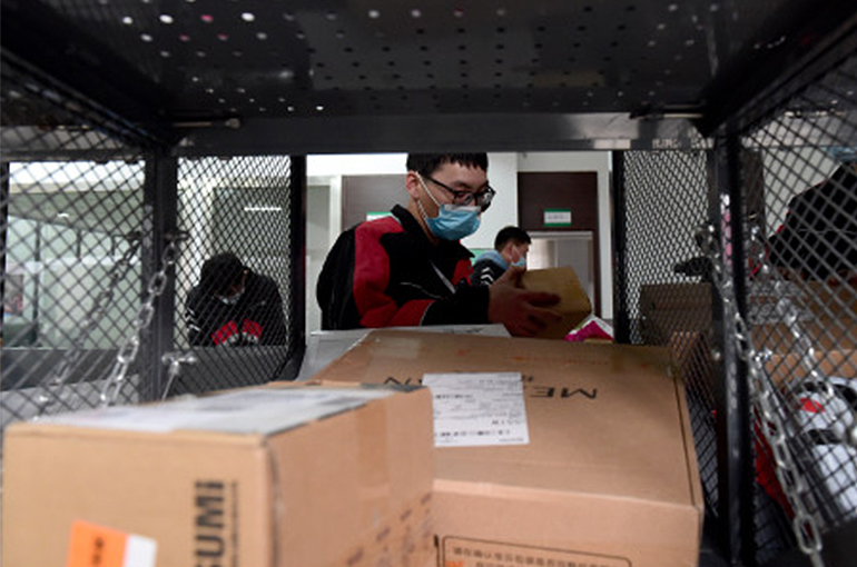 Chinese Couriers Saw Per Parcel Fall Last Year Amid Price