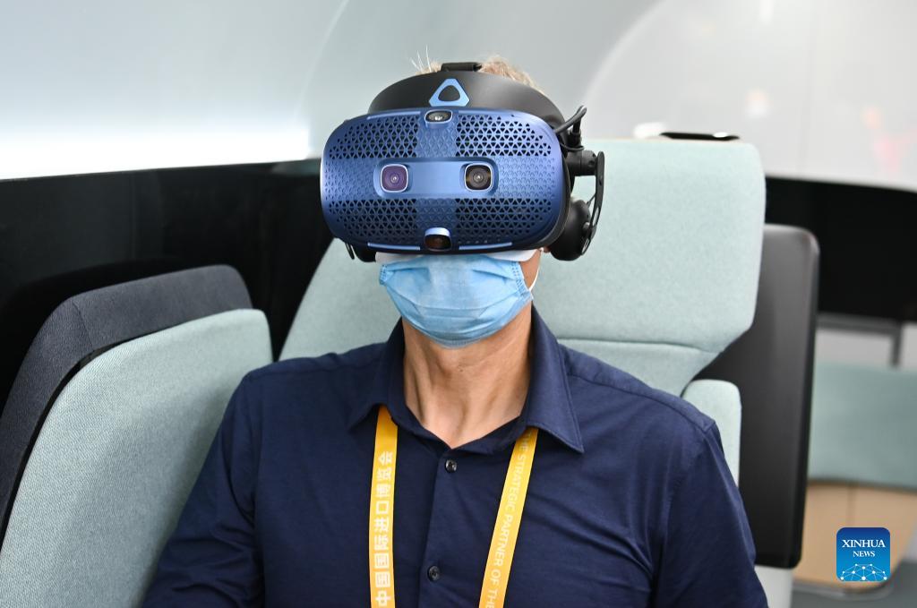 A visitor experiences a virtual reality (VR) device