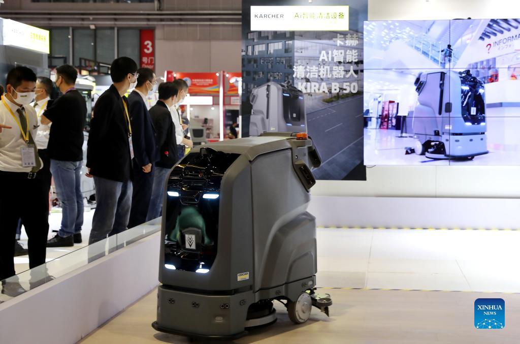 An AI cleaning robot is displayed