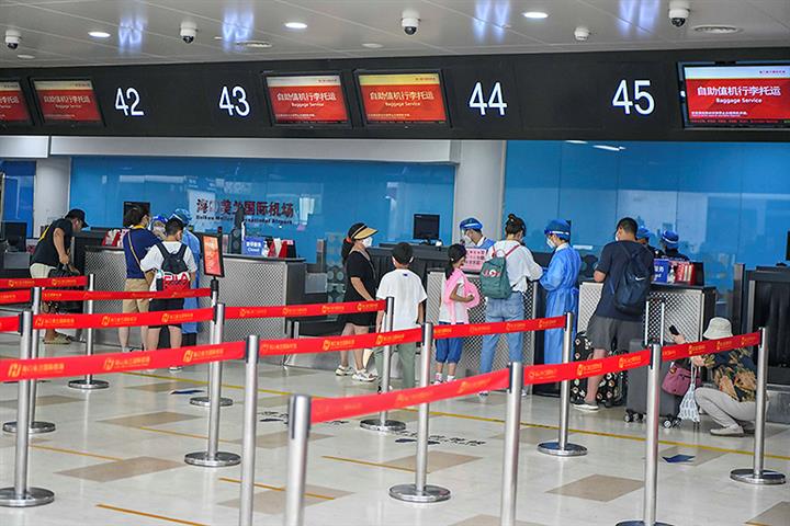 China's Haikou Airport Reopens But Few Flights Leave Covid-Hit Tourist Getaway Island