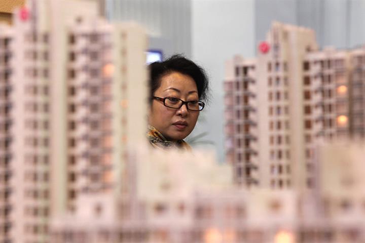 China Slashes Five-Year Benchmark Lending Rate to Prop Up Weak Property Market