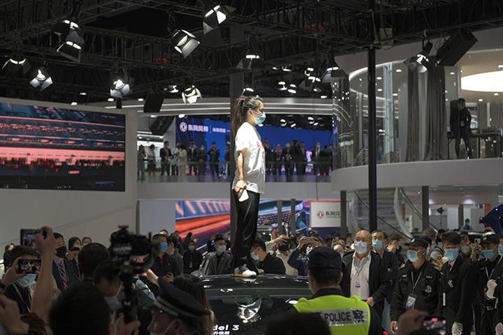 Chinese Police Detain Two Tesla Owners for Causing Havoc at Shanghai Auto Show