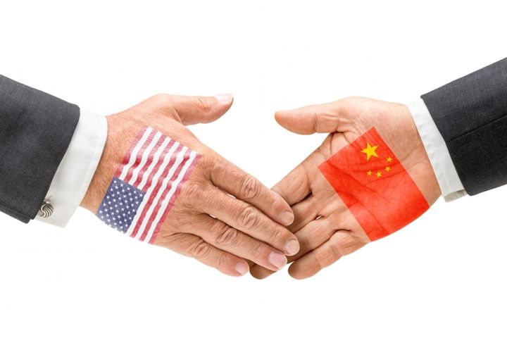 中国と米国の双方向外国直接投資は昨年過去最高の600億米ドルに達した、と報告書は述べている