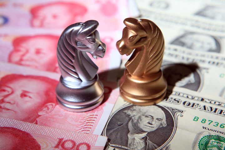 Fed Coos Dovishly as Yuan Rallies to Nine-Month High Against Dollar