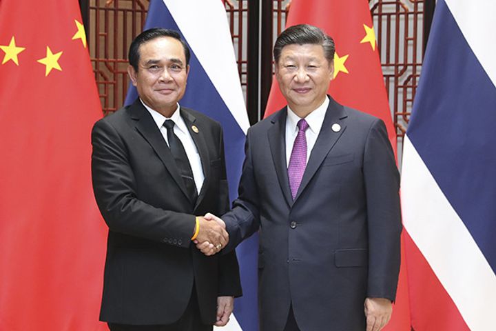 China's Xi and Thailand's Prayut Witness Signing of Bilateral Cooperation Agreement