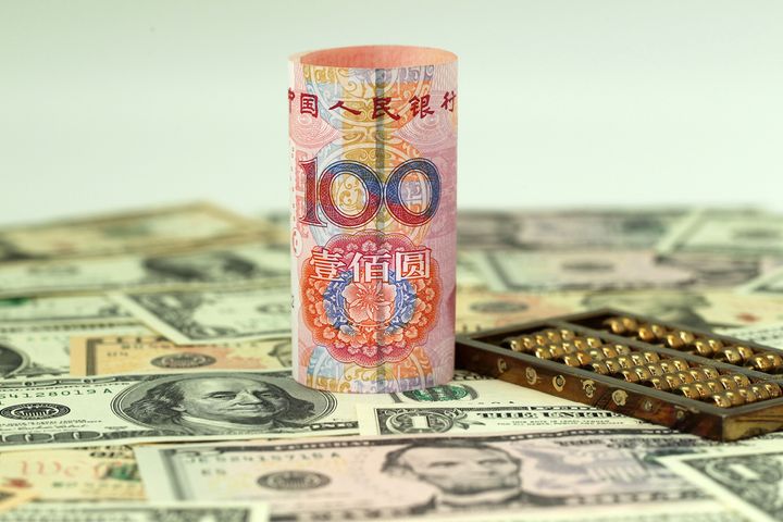 PBOC Cuts Yuan-Dollar Central Parity Rate by 85 Basis Points