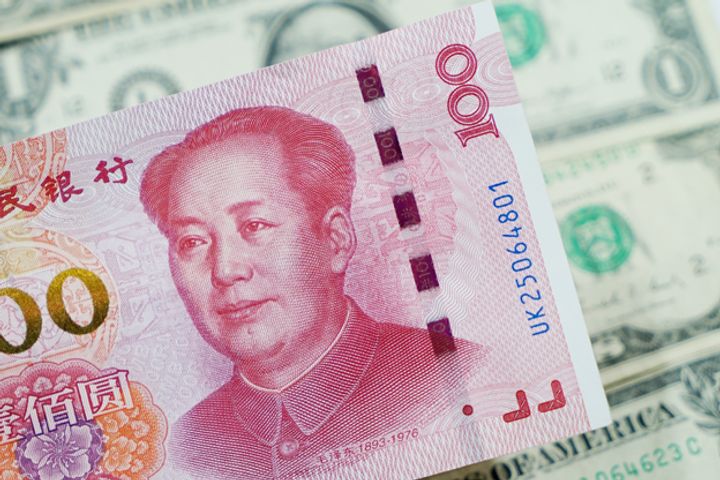 Yuan Rallies to 31-Month High as Dollar Index Dives