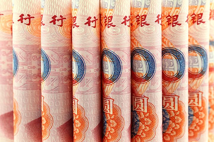 Overseas Institutions Raise Yuan Bond Holdings for 12 Straight Months
