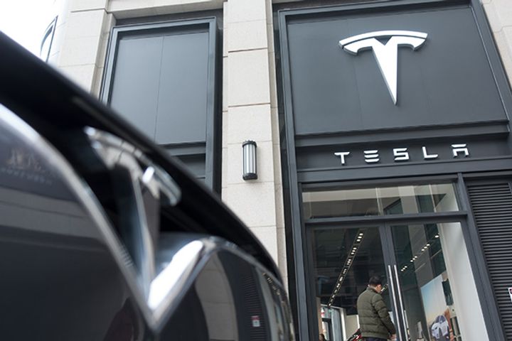 Tesla, BMW and Other Carmakers May Slash China Prices on Import Tax Cut