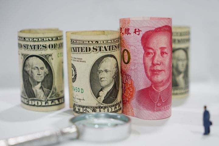 Yuan Falls to Lowest Point Against Dollar Since January