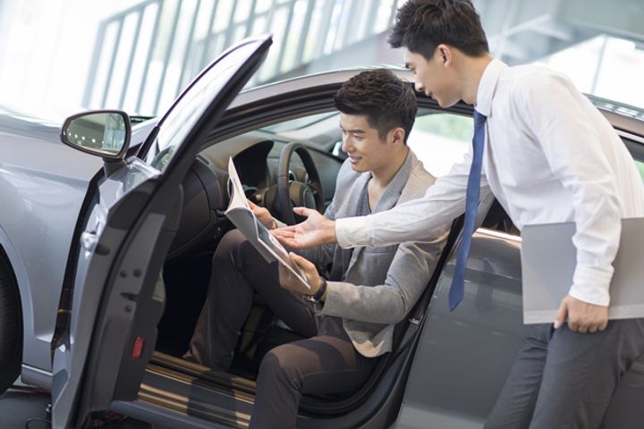 China's Development Agency Denies Report It Plans to Halve Car Tax