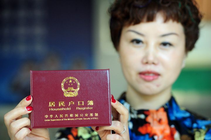 China to Ease Restrictions on Migrant Household Registrations