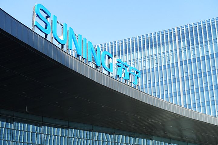 Shenzhen Bourse to Examine Suning's Wanda Chain Store Purchase