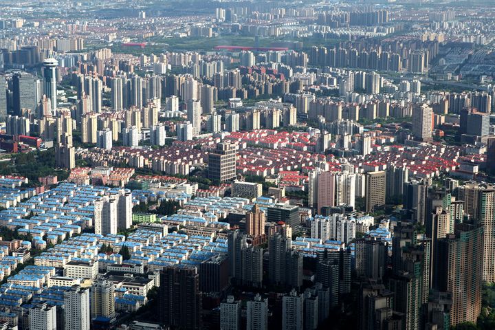China's Home Prices Edged Up in March as Financing Got Easier, CASS Says