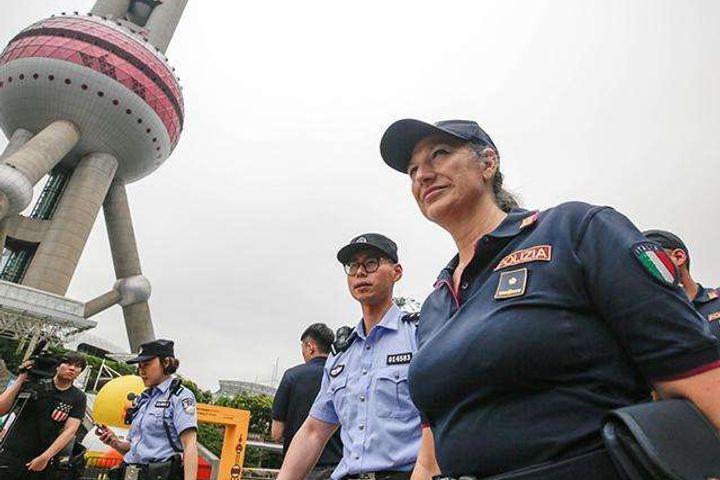 Italian Police Pound Shanghai Pavements in Third China-Italy Patrol