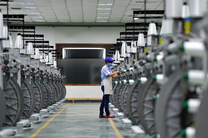 中国の工場活動は7月に契約ゾーン内で0.3% に上昇