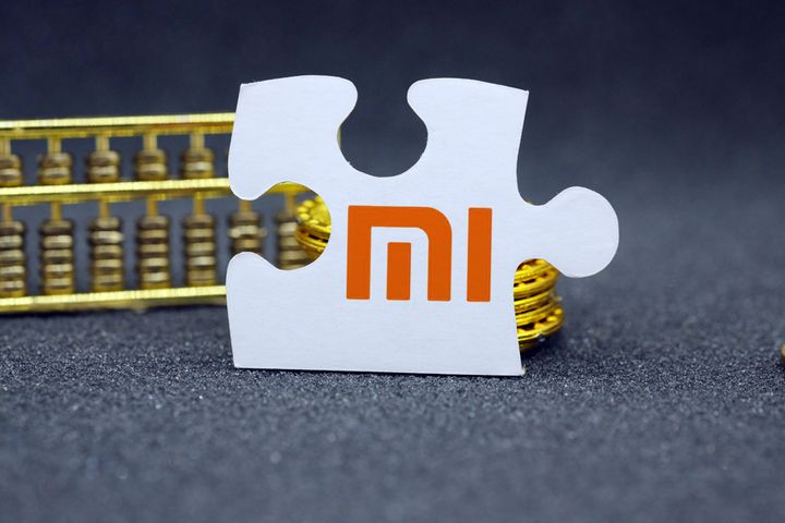 Xiaomi Dips as 18% of Equity Is Unlocked a Year After Hong Kong IPO