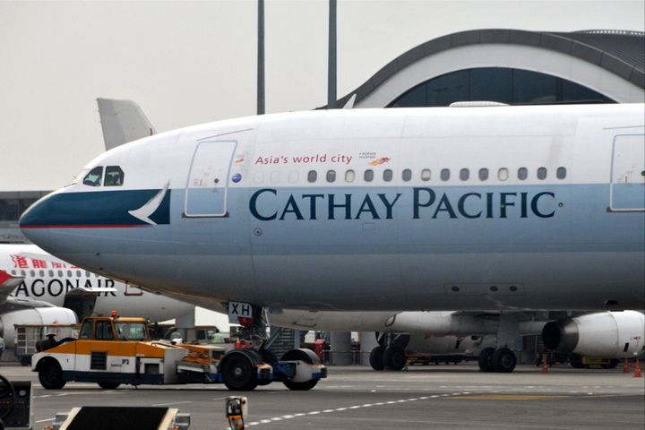 Cathay Pacific Issues Drab Outlook After Swinging Back to Profit in First Half