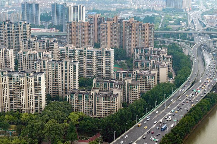 China's Fixed-Asset Investment Rose 5.4% in First Three Quarters  
