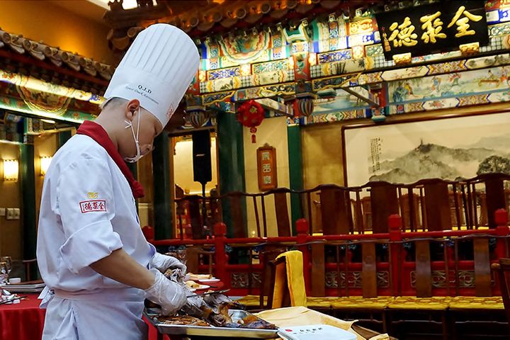 Beijing Eatery Chain Quanjude's President Ducks Out as Earnings Head South