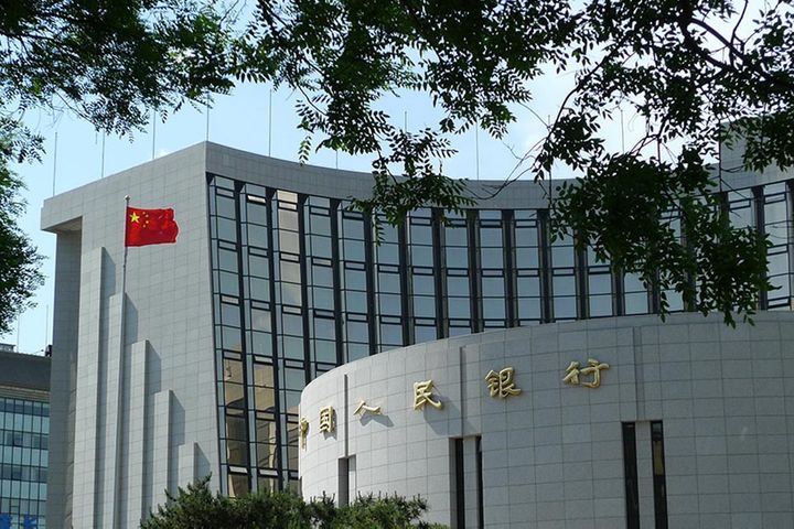 PBOC Snips Interest Rate 5 Bps in Four-Year First as Growth Sputters