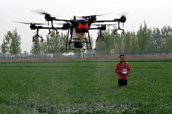 China's DJI Eyes Bigger Fields With Agricultural Drone T20