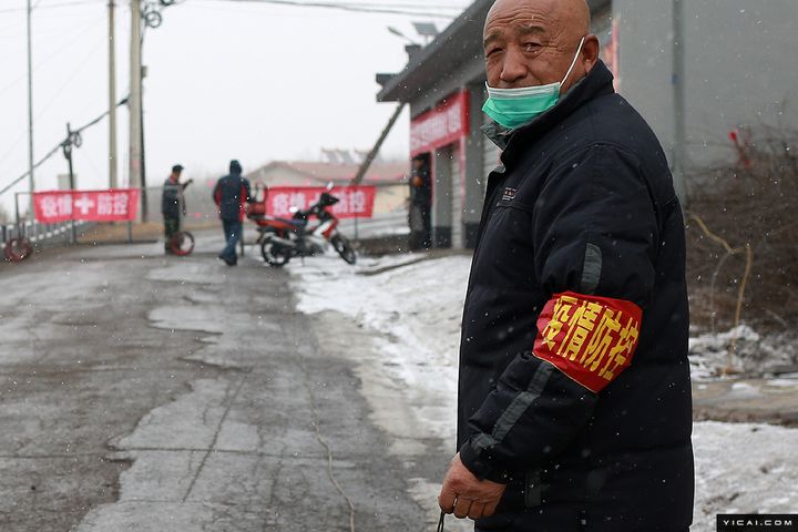 Coronavirus Casts a Pall Over New Year Celebrations in a Small Chinese Town 