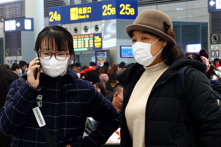 Facial Masks Sell Out in China as New Virus Spreads