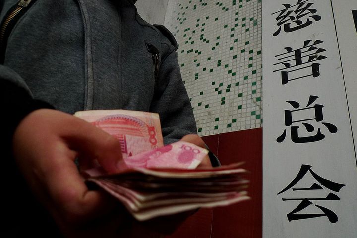 Feeling Economic Bite, China's Top 100 Donors Gave 38% Less Last Year, Ranking Shows