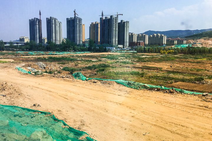 Beijing Sells Land for Quarter Over Asking Price as City Scraps Price Cap