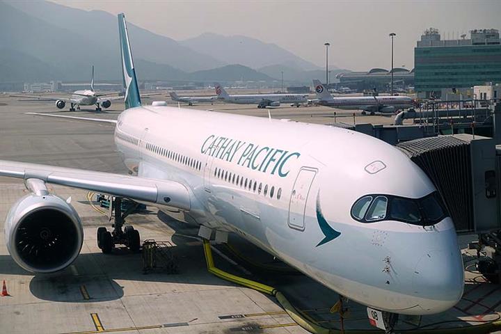 Cathay Pacific, Swire Pacific, Air China Suspend Trading in Hong Kong
