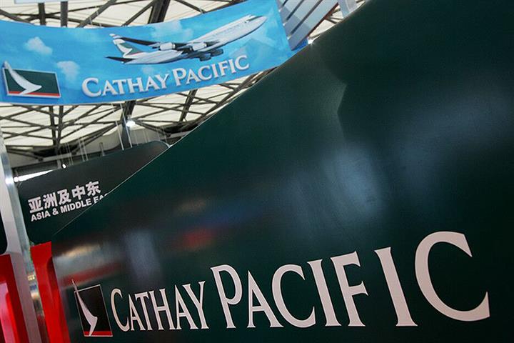 Hong Kong Throws Lifeline to Cathay Pacific, but Not to Own It, Official Says 