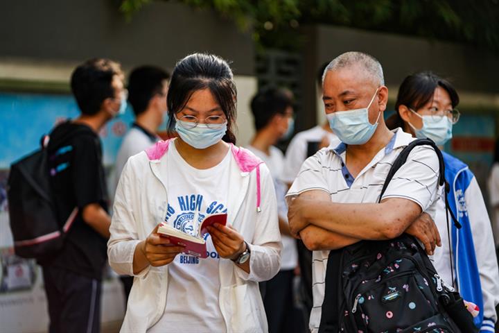 Beijing Reports Zero New Covid-19 Cases for First Time in 25 Days