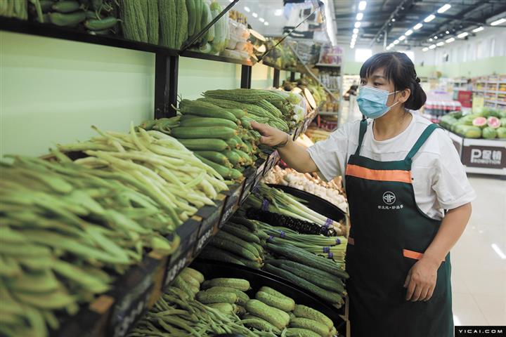 [写真で] 北京Xinfadi卸売市場は、Covid-19になった後、ビジネスを再開します