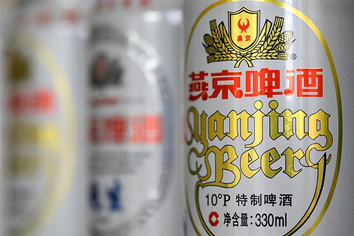 Beijing Yanjing Brewery’s Stock Tanks as Chairman Is Detained