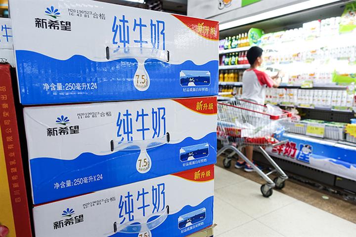 Yantang, New Hope Jump as Chinese Dairy Firms Predict Profit to Nearly Double in First Half