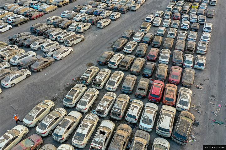 [写真で] 暴風雨が中国の鄭州で40万台以上の車を破壊した