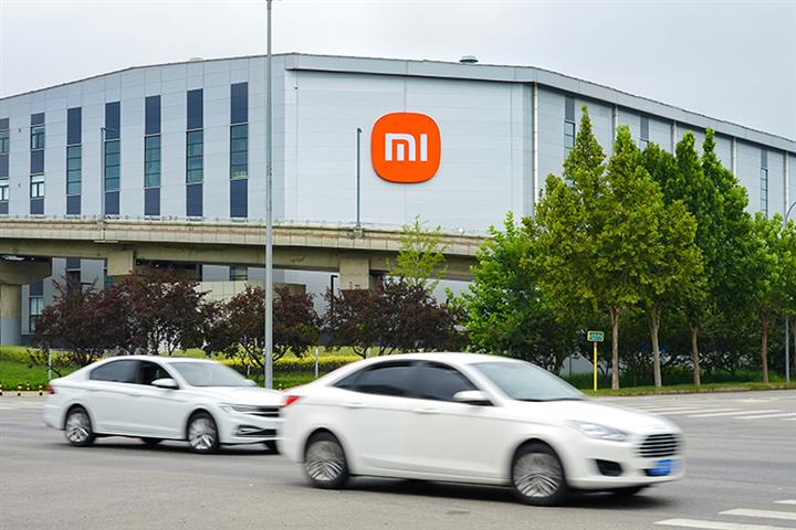 Xiaomi Hikes Wages to Lure NEV Talent