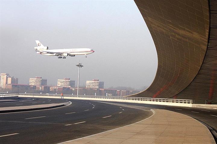 China Limits Beijing-Bound Flights Amid Latest Covid-19 Wave in Further Blow to Airlines