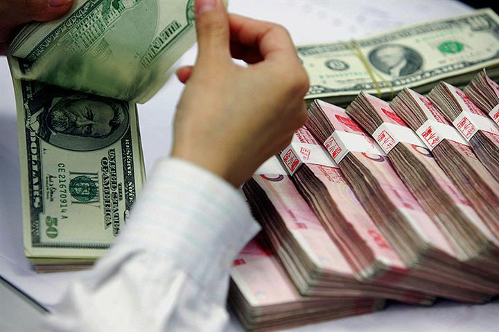 Chinese Yuan to Stay Strong Versus US Dollar After Gaining for Three Months, Analysts Say
