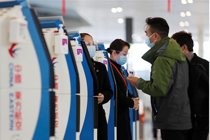 China’s Air Passenger Numbers Climb Back Less Than Expected in 2021, CAAC Says