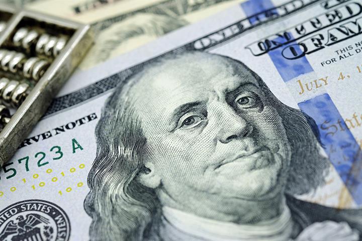 中国は12月に米国の債務ホールディングスを122億米ドル削減