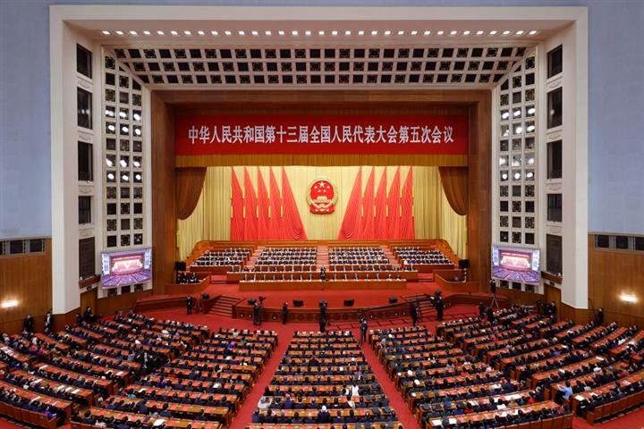 中国の国民議会が年次総会の閉会を開催