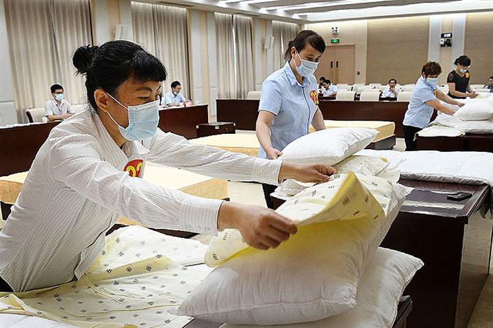 Caixin’s China Composite PMI Sinks to Two-Year Low in March