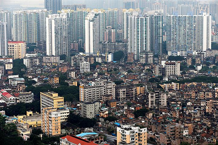 Builder Times China Seeks to Exit Eight Guangzhou Projects as Policy Shifts, Sales Fall
