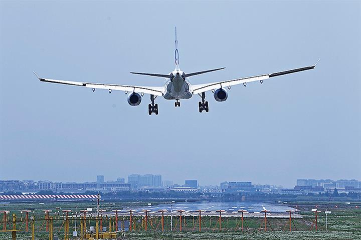 Shanghai’s Airports to Restart International Flights Tomorrow With Bigger Passenger Loads