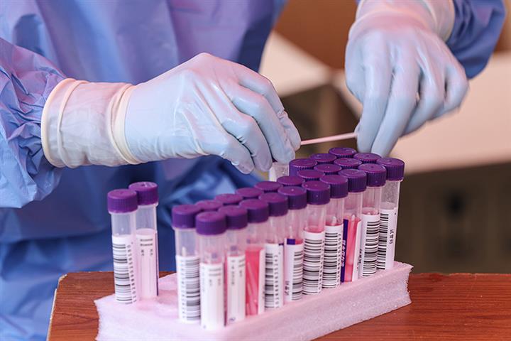 Chinese Covid-19 Testing Firms Reap Big Profits in First Half, But Monies Due Rise Too