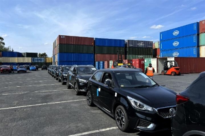 China's SAIC, COSCO Exchange Equity for First Time to Ship More NEVs Abroad 