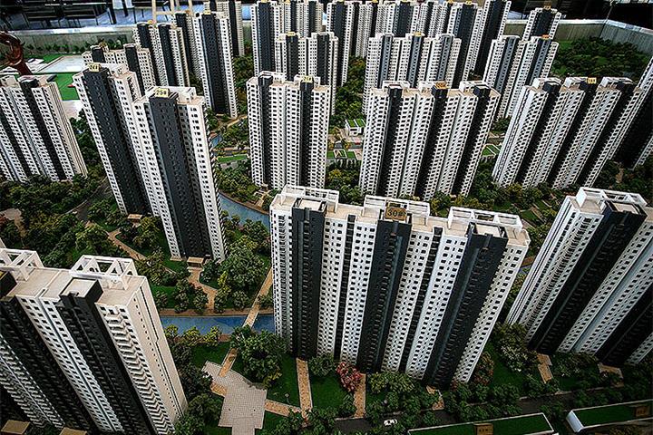 Chinese Real Estate Bonds Pop on Rumor Banks to Help Builders Repay Overseas Debts