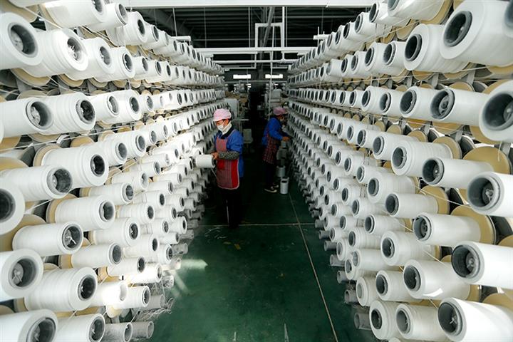 Covid-19 Weighed On China's Industrial, Consumption Recovery in November